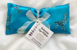 eye pillow with sunny window tag tied with ribbon &copy; sunny window
